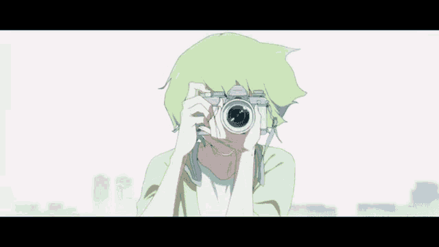 a person with green hair taking a picture with a camera