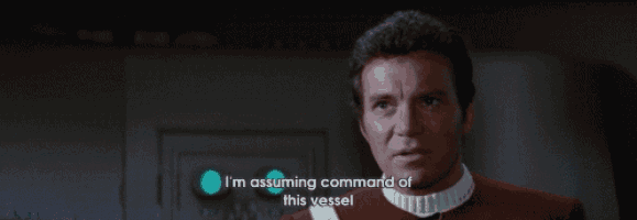 a man in a red uniform is talking about assuming command of a vessel