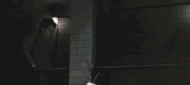 a man laying in a dark room with the words fuuuuuuuck written on his face