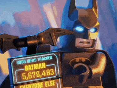 a lego batman holding a sign that says " good ideas tracker "