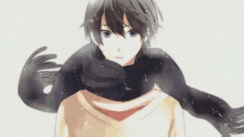 a boy with blue eyes is wearing a scarf and gloves .
