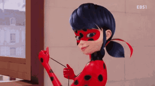ladybug from miraculous ladybug is standing in front of a window holding a yarn .