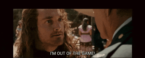 a man with long hair says i 'm out of the game while talking to another man