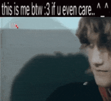 a blurry picture of a man with the words `` this is me btw 3 if u even care ''