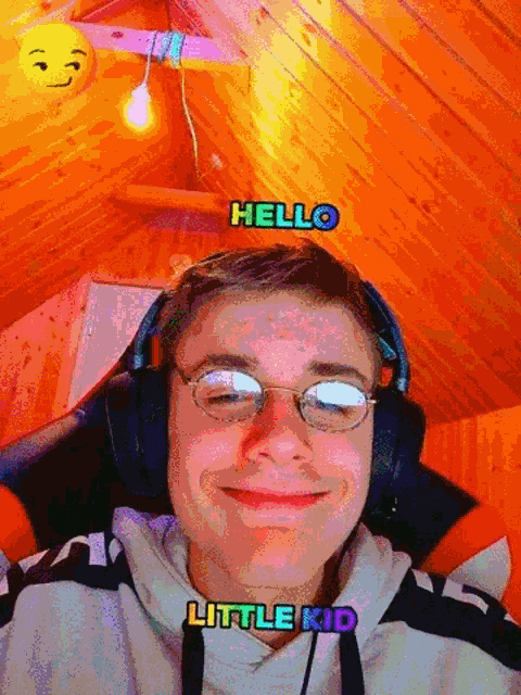 a young man wearing glasses and headphones with the words hello little kid above him