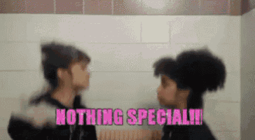 a couple of people standing next to each other with the words nothing special in pink letters