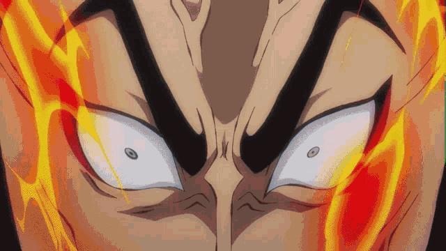 a close up of a person 's face with flames behind it