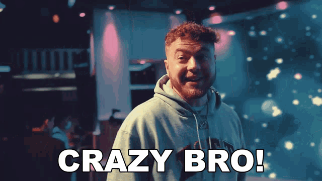 a man in a hoodie says crazy bro in front of a colorful background