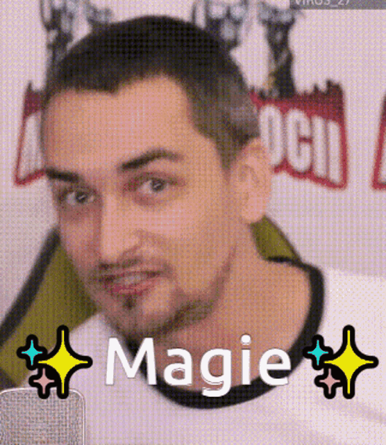 a man in a white shirt with the word magie on it