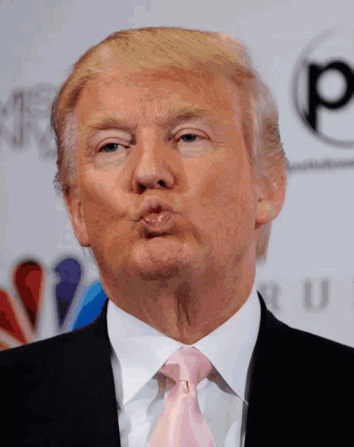 donald trump making a funny face with his mouth open