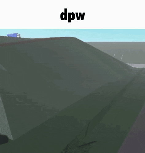 a blue truck is going down a hill in a video game with the word dpw above it