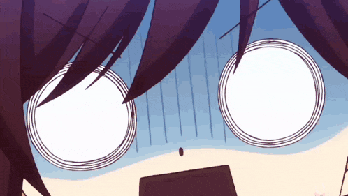 a close up of a person 's face with a surprised expression