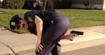 Gun Cop GIF - Gun Cop Fire GIFs