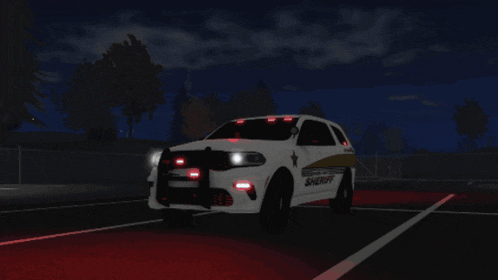 a sheriff 's car is parked in a parking lot