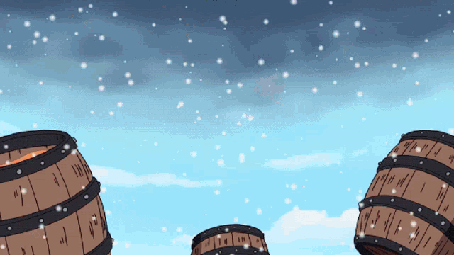 three wooden barrels are standing in the snow
