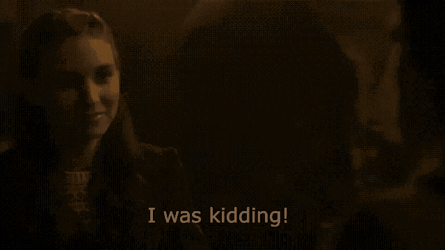a woman says i was kidding in a dark room .