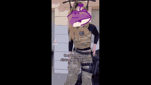 a woman in a military uniform says they told me to distract the sniper on a tiktok video