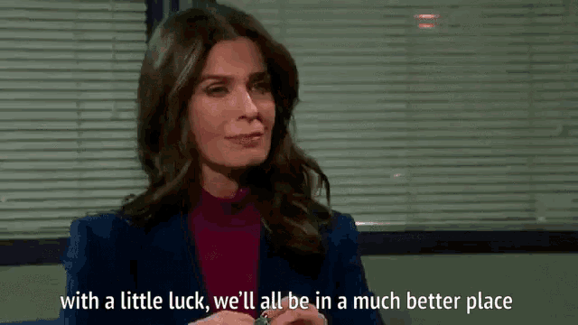 a woman is sitting in a chair and saying with a little luck , we 'll all be in a much better place