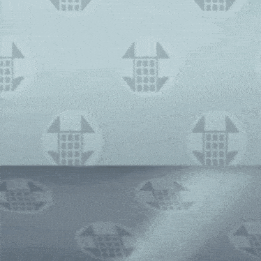 a wall with a pattern of squares and triangles