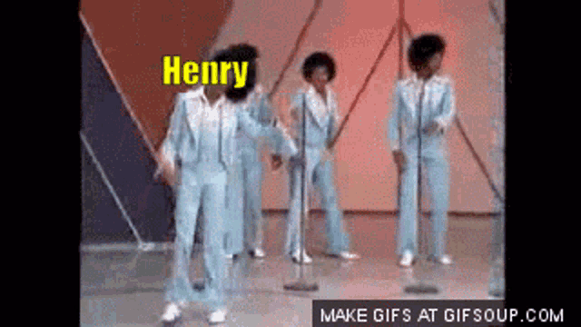 a group of men are dancing in front of microphones and the name henry is visible