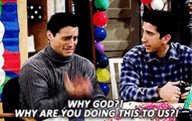 two men are sitting at a table talking to each other and one of them is asking why are you doing this to us ?