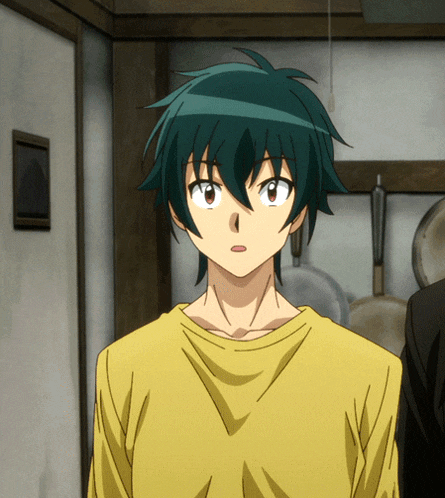 a boy with green hair and a yellow shirt