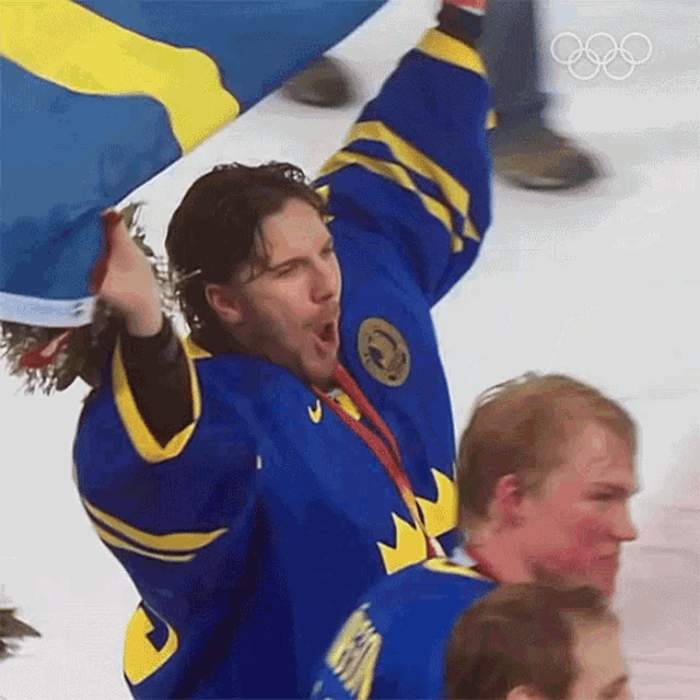 Waving A Flag Ice Hockey GIF - Waving A Flag Ice Hockey Henrik Lundqvist GIFs