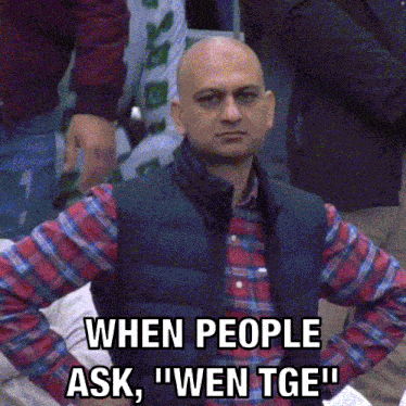 a bald man in a plaid shirt says " when people ask , " wen tge "