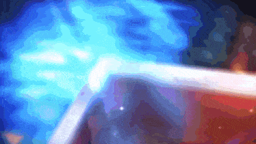 a blurry picture of a blue light coming out of a hole in the ground