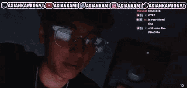 a man wearing glasses is taking a picture of himself with a 4k watermark