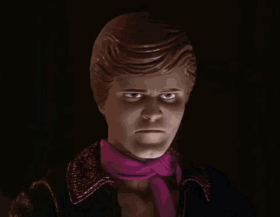 a close up of a doll with blue eyes and a purple scarf around his neck