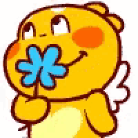 a yellow cartoon character with wings is holding a blue flower in his mouth .