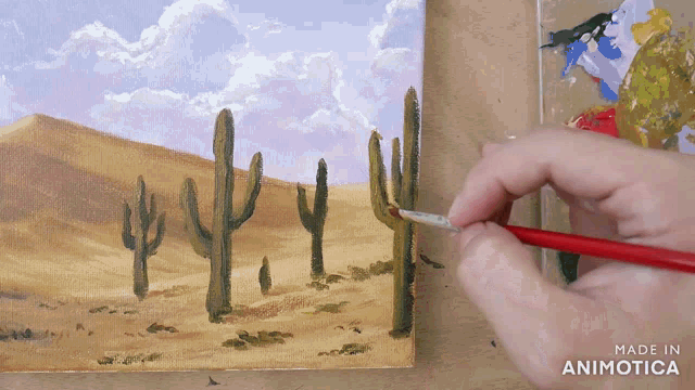 a person is painting a desert scene with the words made in animatica on the bottom