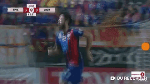 a soccer player in a blue and red jersey with the number 7 on it