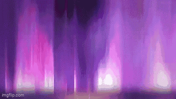 a purple background with a lot of purple lights and smoke coming out of it .