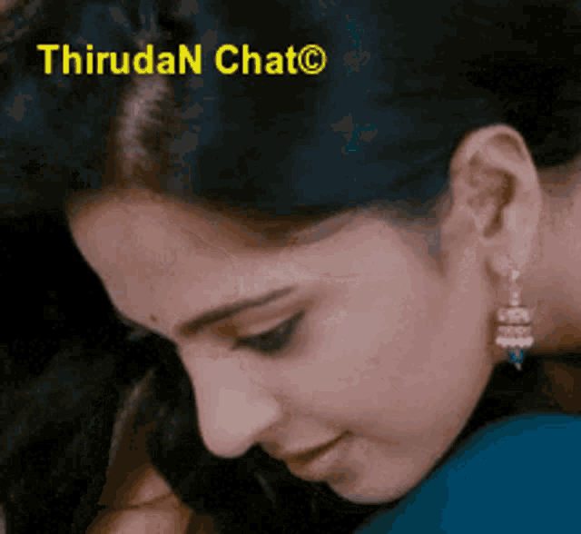 a close up of a woman 's face with the words thiruda n chat written above her