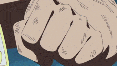 a close up of a person 's fist with a few stitches on it