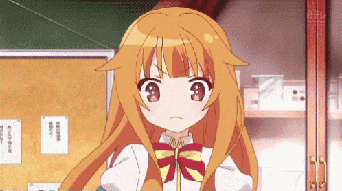 a girl with long orange hair is standing in front of a bulletin board with chinese writing on it
