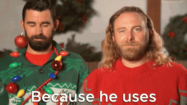 two men wearing ugly christmas sweaters are standing next to each other with because he uses written on the bottom