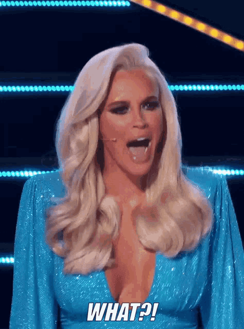 a woman in a blue dress says what ?