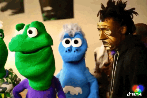 a frog and a blue monster are standing next to each other with a tiktok logo in the corner