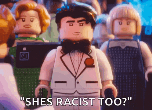 a lego man in a tuxedo and bow tie says " shes racist too "