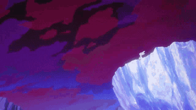 a person is climbing up a mountain in a cave