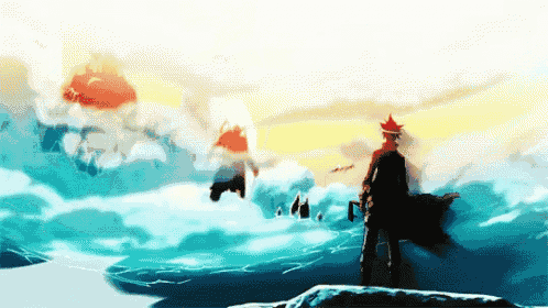 a man in a red cape stands on a rock overlooking the ocean