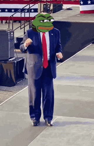 a man in a suit and tie with a frog head