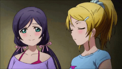 two anime girls are standing next to each other and one is wearing a purple shirt