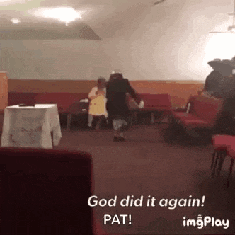 a man and woman are dancing in a church with the words god did it again pat on the bottom
