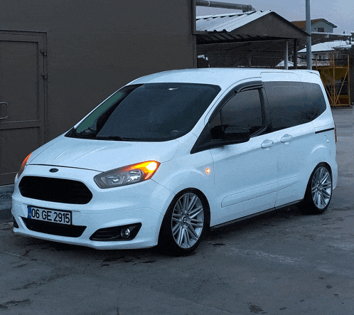 a white van with the license plate 06 ge 2915
