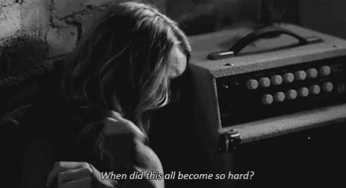 a black and white photo of a woman with a quote on it .
