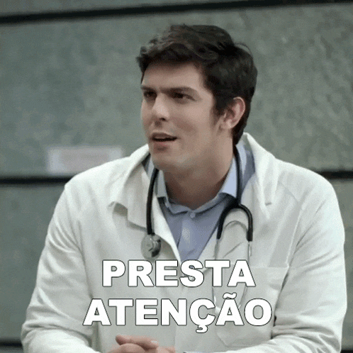 a man in a lab coat with a stethoscope around his neck says " presta atenção "
